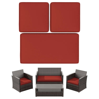 Outdoor patio furniture set with dark wicker frame and deep red cushions including sofa, two armchairs, and coffee table
