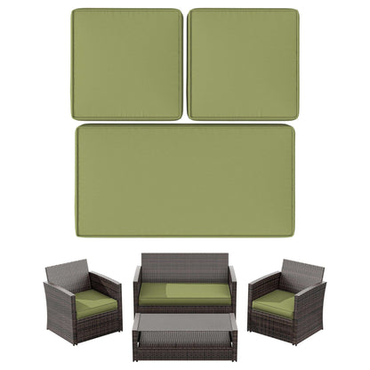 Outdoor brown wicker patio furniture set with green cushions including loveseat, two chairs, coffee table, and cushions