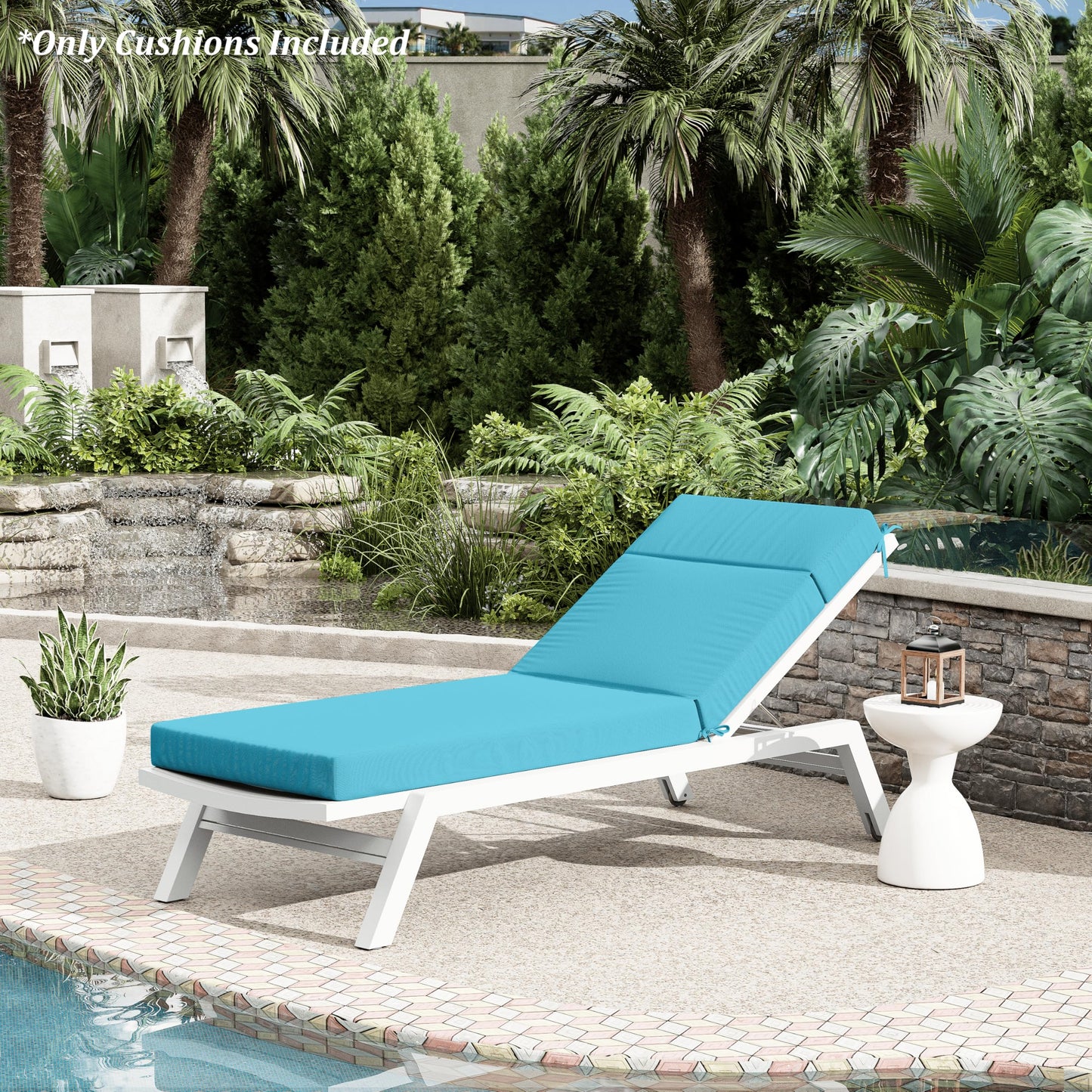 Blue cushioned outdoor lounge chair with white frame on a patio with pool and garden view.