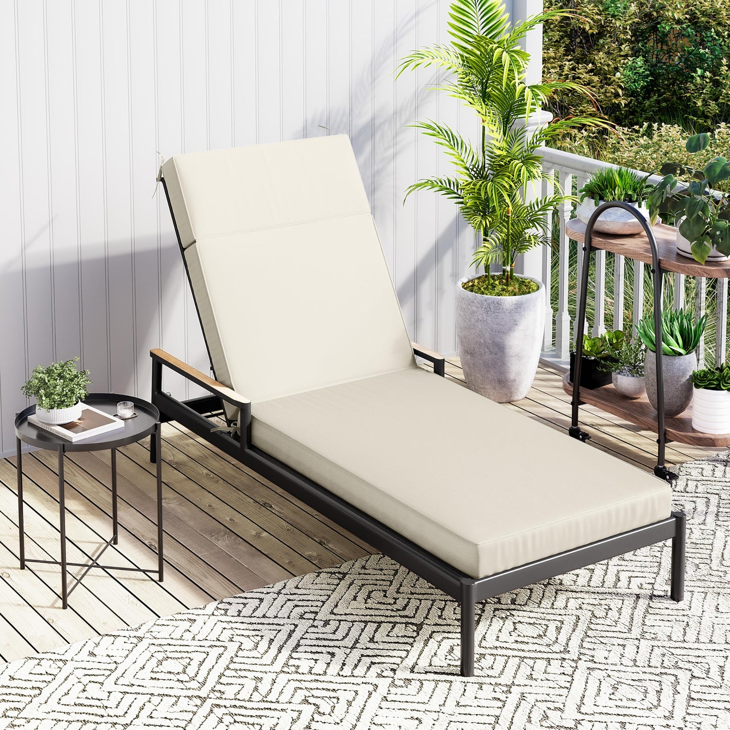 Beige lounge chair on a balcony with plants and a small table.