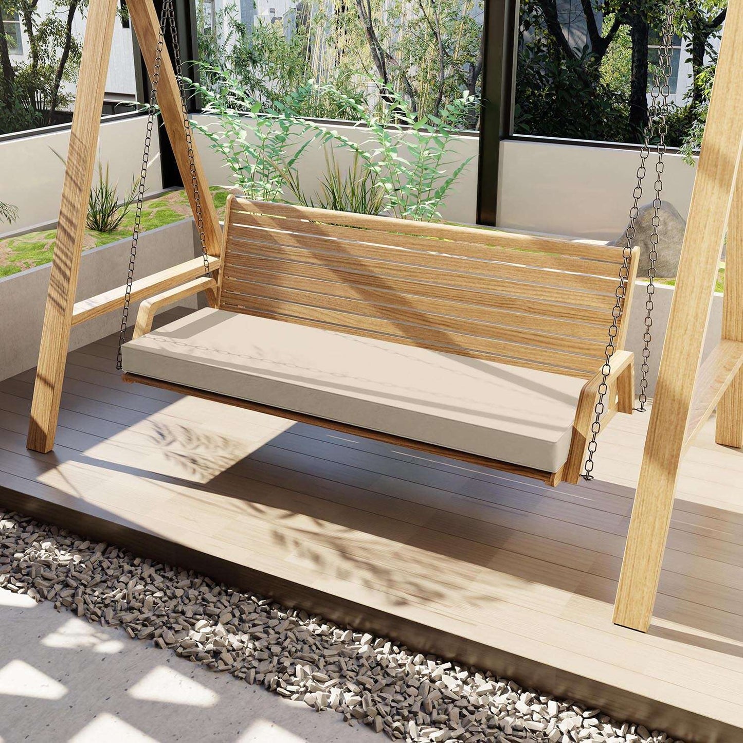 Wooden swing with a cream cushion on a wooden deck in an outdoor setting