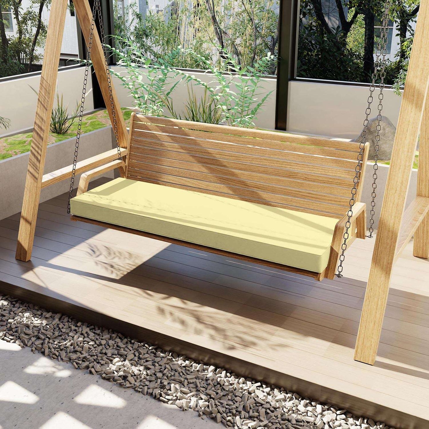 Wooden swing with a yellow cushion on a wooden deck