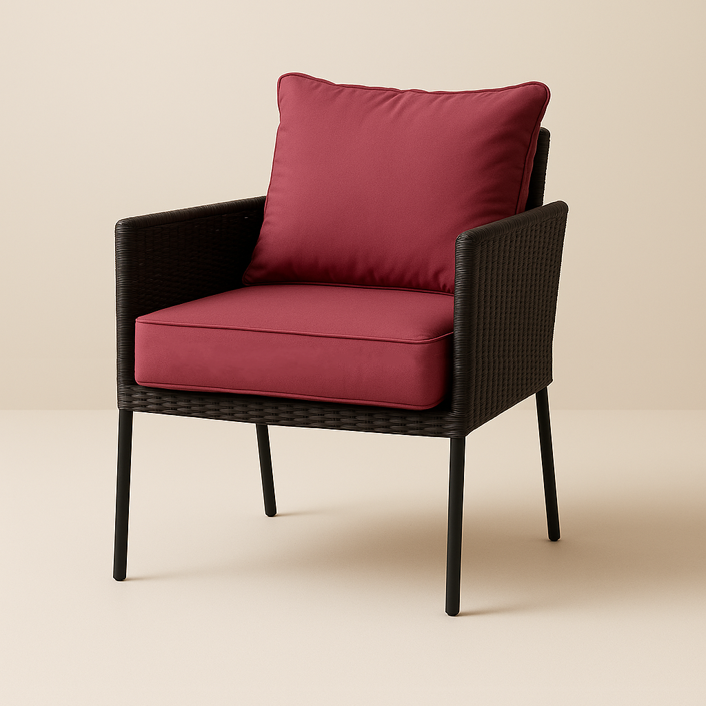 fuchsia red cushions on a rattan chair