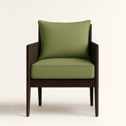 green thick cushion and pillow set on a wicker chair