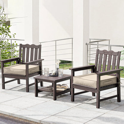 Outdoor furniture set with two chairs and a table on a patio.