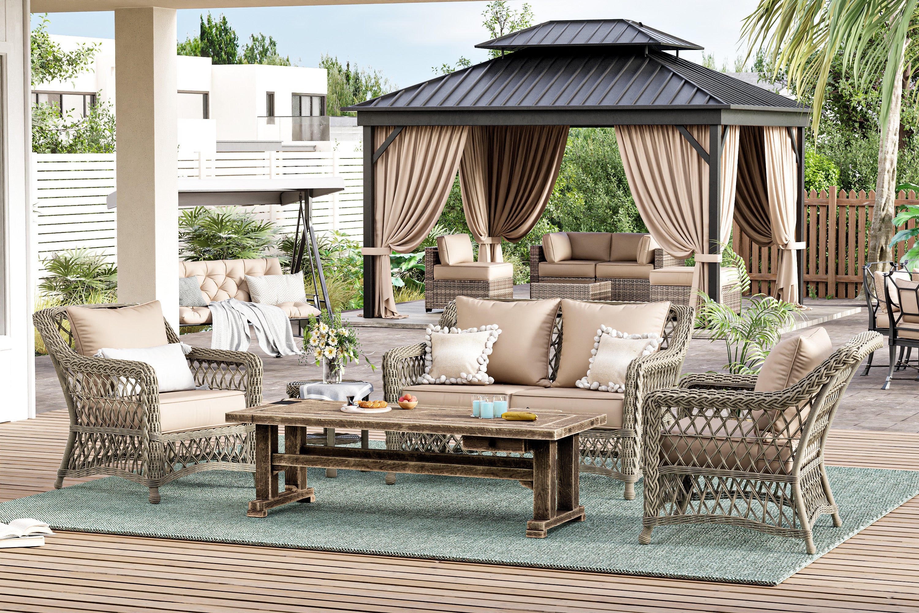 Patio set with gazebo, tables, and chairs on a wooden deck.